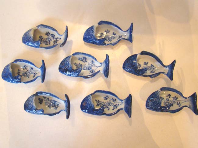 A beautiful set of eight late 19th century Chinese porcelain fish shaped condiment dishes